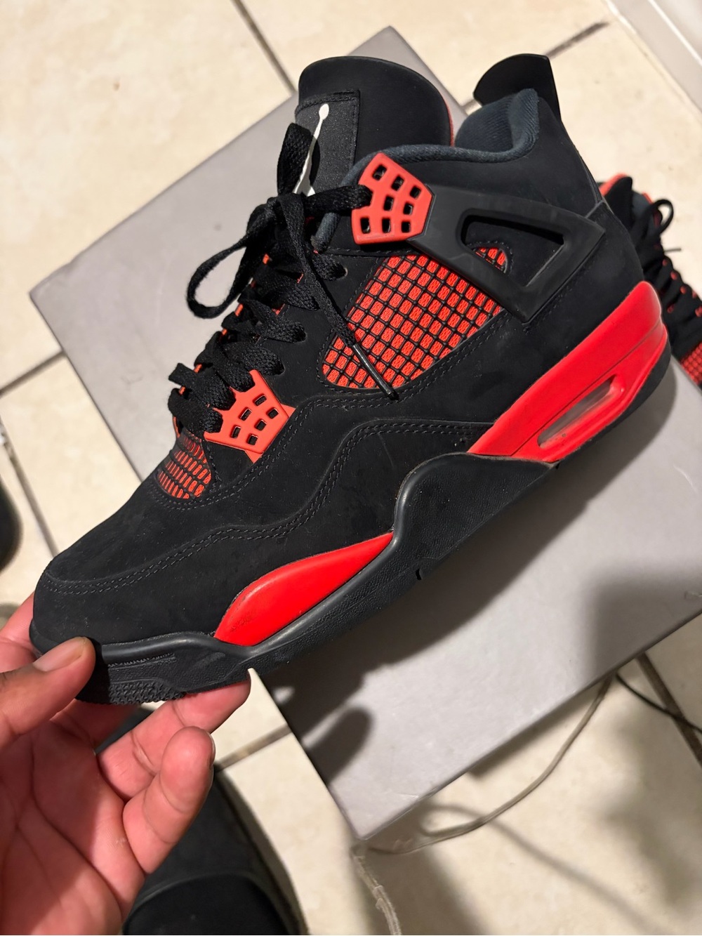 Jordan Retro 4 in Black and Red